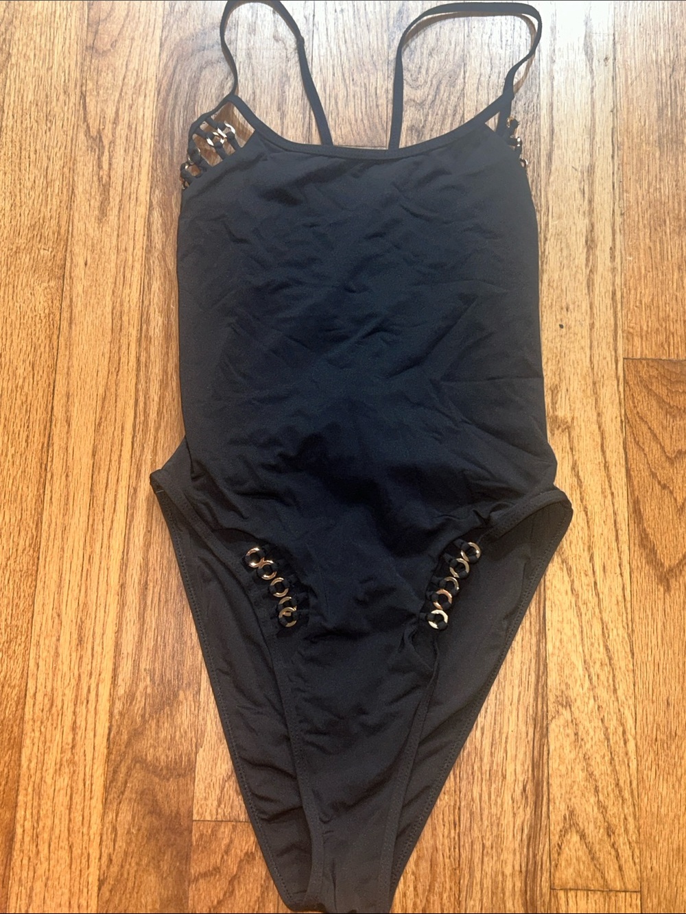 ICON Black One-Piece Swimsuit with Gold Accent Rings